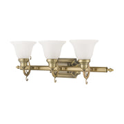 French Regency 3-Light Bath Vanity Light in Antique Brass