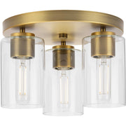 Cofield 3-Light Clear Glass Flush Mount in Vintage Brass