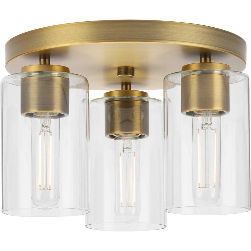 Cofield 3-Light Clear Glass Flush Mount in Vintage Brass