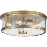 Gilliam 2-Light Clear Glass Flush Mount in Vintage Brass