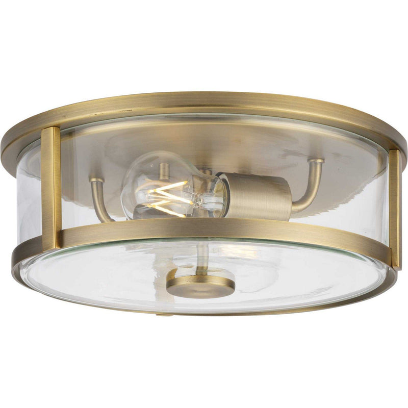 Gilliam 2-Light Clear Glass Flush Mount in Vintage Brass