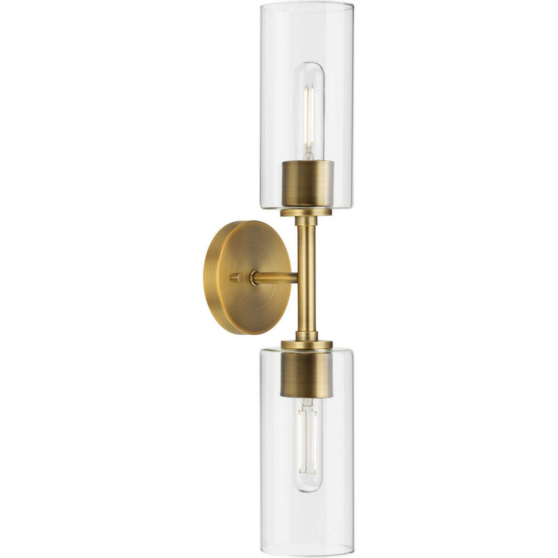 Cofield 2-Light Clear Glass Wall Sconce in Vintage Brass