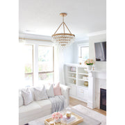 Calypso 6 Light 20" Pendant in Vibrant Gold in a room setting