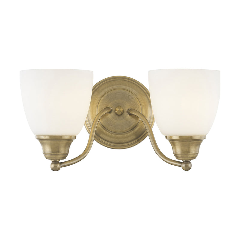 Somerville 2-Light Armed Bath Vanity Light in Antique Brass