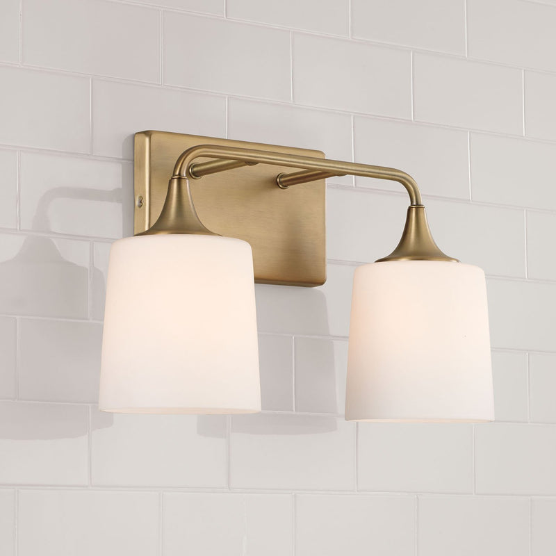 Presley 2-Light Bath Vanity Light in Aged Brass