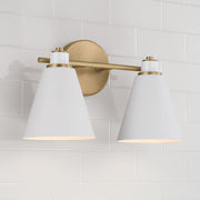 Bradley 2-Light Bath Vanity Light in Aged Brass and White