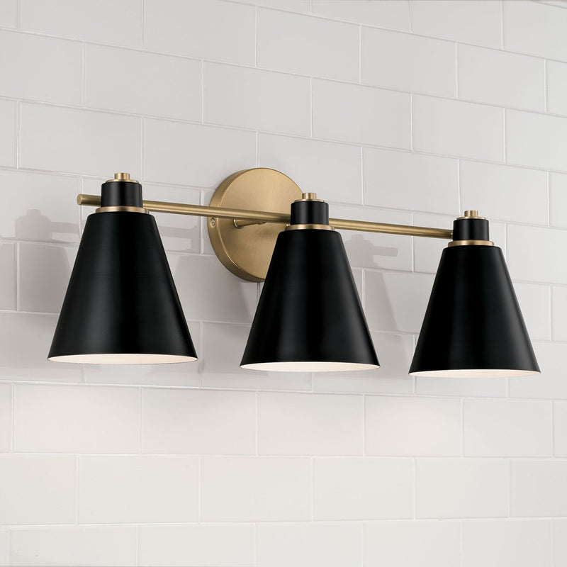 Bradley 3-Light Bath Vanity Light in Aged Brass and Black