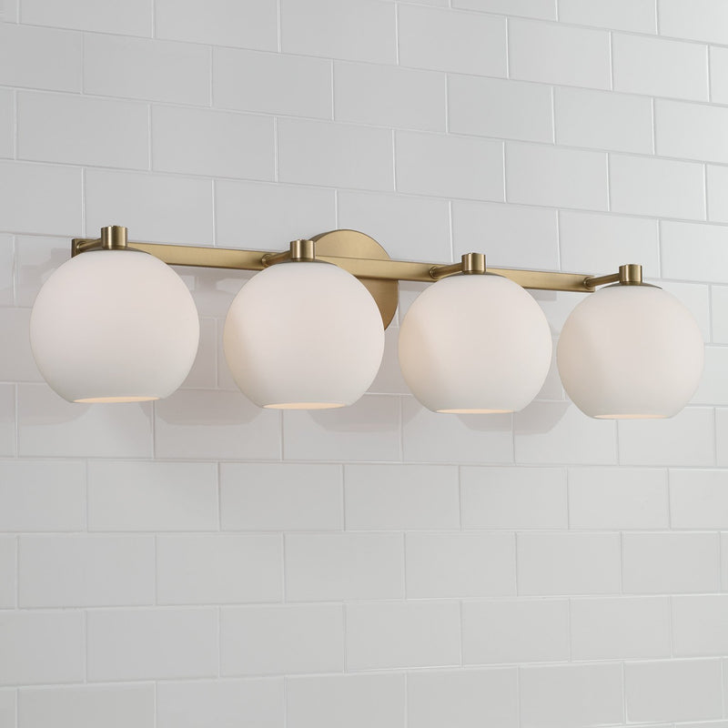 Ansley 4-Light Bath Vanity Light in Aged Brass