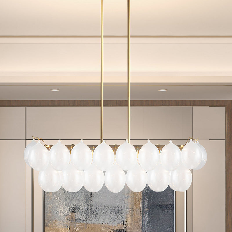 Globo 8-Light Linear Pendant in Brass