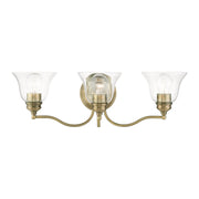 Moreland 3-Light 24" x 7.5" Bath Vanity Light in Antique Brass