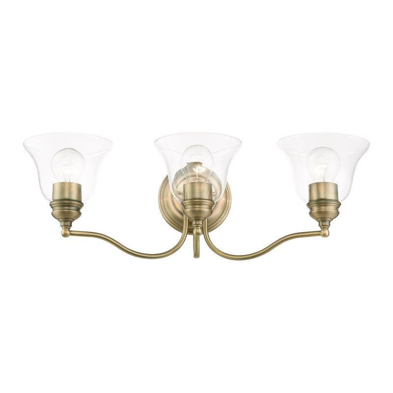 Moreland 3-Light 24" x 7.5" Bath Vanity Light in Antique Brass