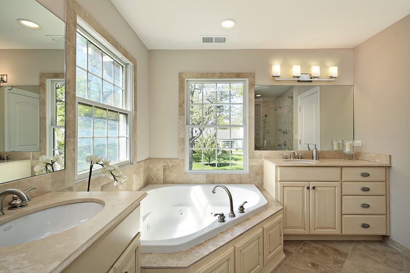 Tidal 4 Light 33.25" Vanity in Chrome in a room setting