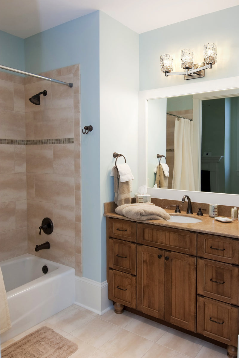 Aubrey 3 Light 22.5" Vanity in Brushed Nickel in a room setting