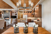 Flair 5 Light 25.5" Chandelier in Antique Nickel in a room setting