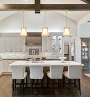 Lenyx Chandelier 10" Chandelier in Rubbed Brass in a room setting