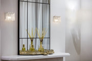 Glacier 1 Light 7.75" Wall Sconce in Brushed Nickel in a room setting