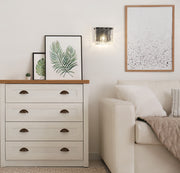 Glacier 1 Light 7.75" Wall Sconce in Matte Black in a room setting