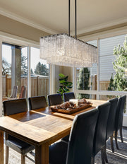 Glacier 5 Light 42.75" Linear Pendant in Matte Black in a room setting