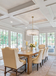 Glacier 10 Light 26.75" Pendant in Modern Gold in a room setting