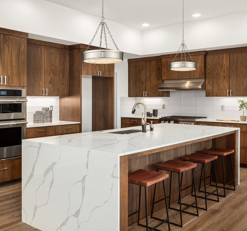 Anders 3 Light 22" Pendant in Polished Nickel in a room setting