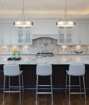 Anders 3 Light 33" Pendant in Polished Nickel in a room setting
