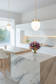 Gideon 1 Light 12.5" Pendant in Modern Gold in a room setting
