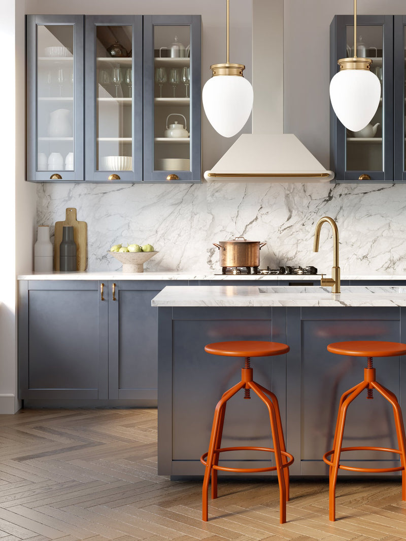 Gideon 1 Light 10" Pendant in Modern Gold in a room setting