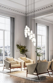 Cayden 11 Light 24" Pendant in Brushed Nickel in a room setting