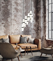 Cayden 11 Light 24" Pendant in Matte Black in a room setting