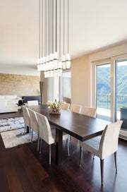 Cayden 17 Light 42" Linear Pendant in Brushed Nickel in a room setting