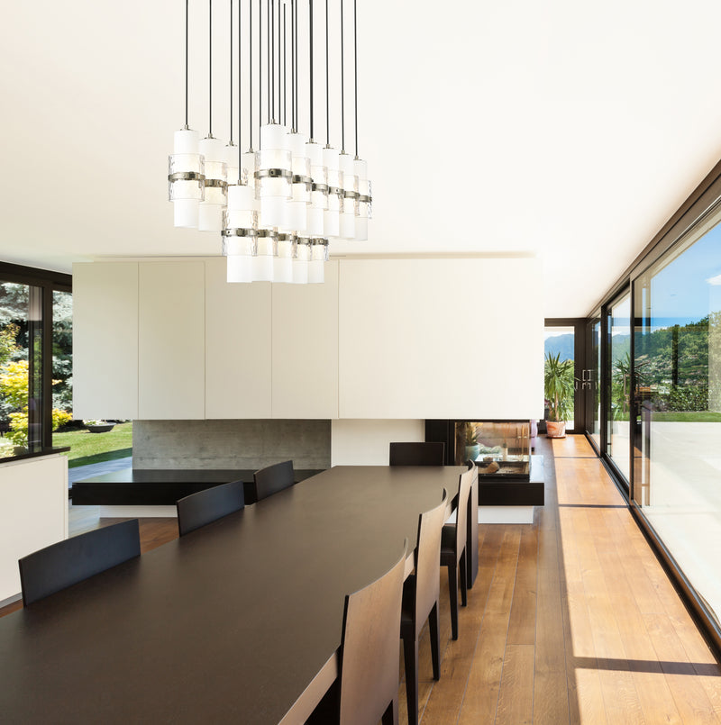 Cayden 17 Light 42" Linear Pendant in Brushed Nickel in a room setting