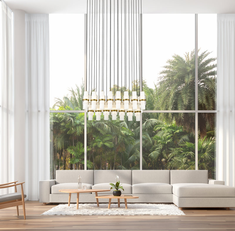 Cayden 23 Light 54" Linear Pendant in Modern Gold in a room setting