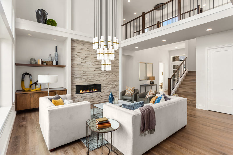 Cayden 27 Light 36" Pendant in Modern Gold in a room setting