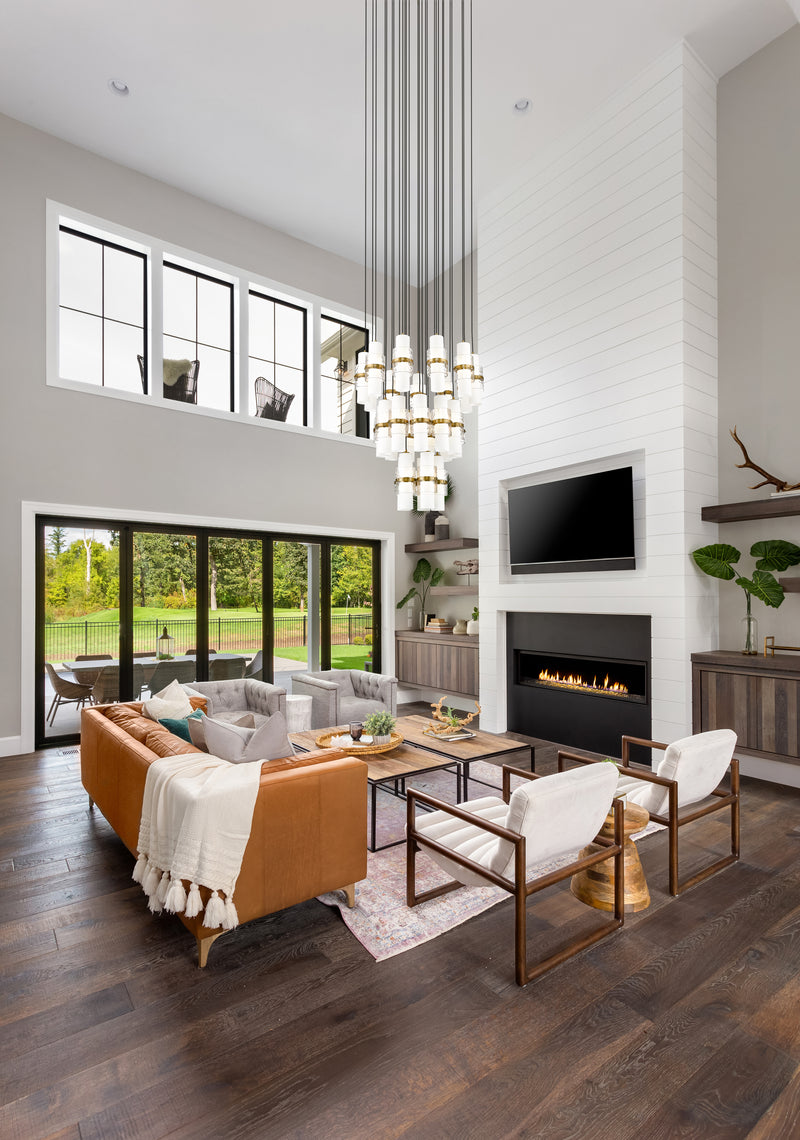 Cayden 27 Light 36" Pendant in Modern Gold in a room setting
