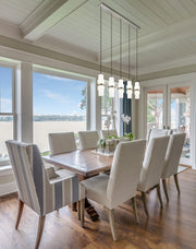 Cayden 5 Light 42" Linear Pendant in Brushed Nickel in a room setting