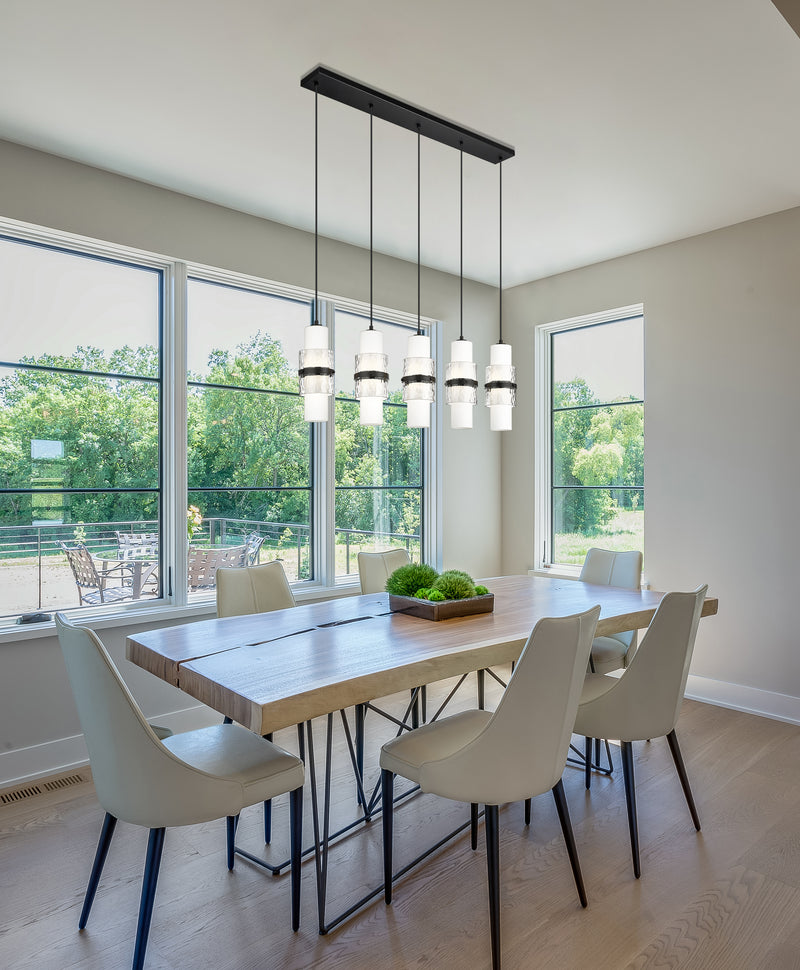 Cayden 5 Light 42" Linear Pendant in Matte Black in a room setting