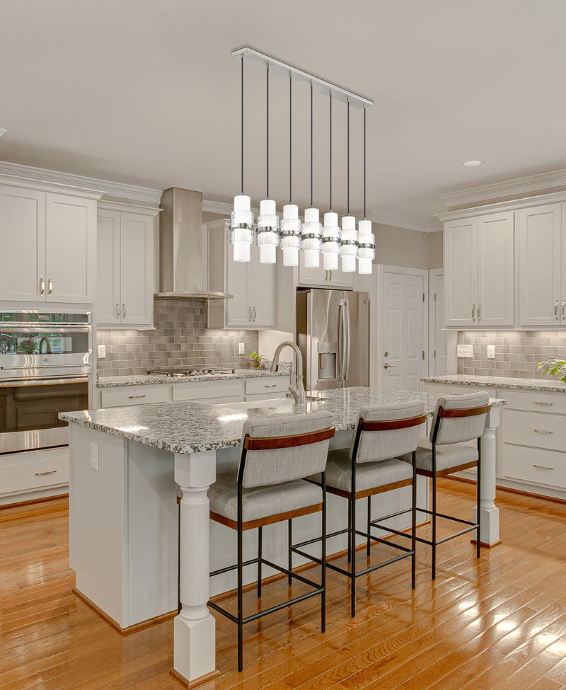 Cayden 7 Light 54" Linear Pendant in Brushed Nickel in a room setting