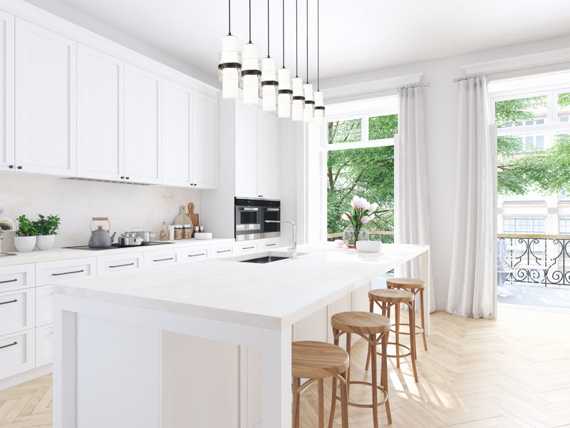 Cayden 7 Light 54" Linear Pendant in Matte Black in a room setting