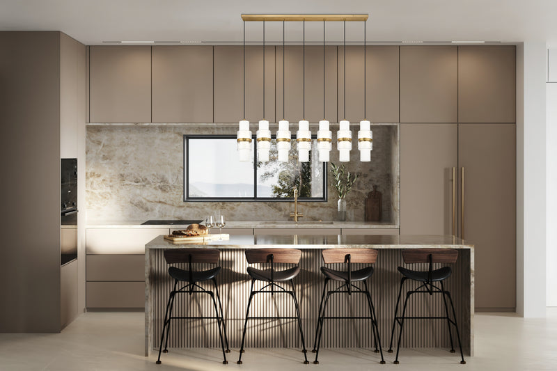 Cayden 7 Light 54" Linear Pendant in Modern Gold in a room setting