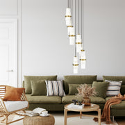 Cayden 7 Light 18" Pendant in Modern Gold in a room setting