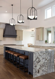 Devon 4 Light 18" Pendant in Matte Black in a room setting
