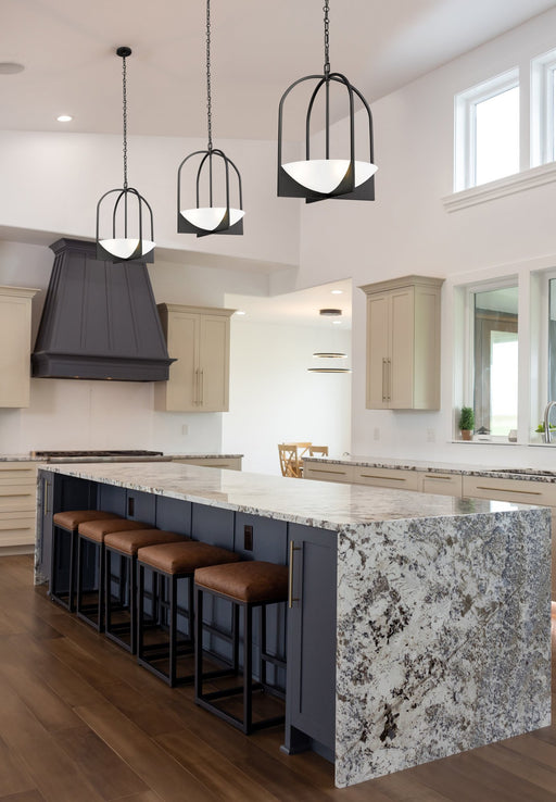 Devon 4 Light 18" Pendant in Matte Black in a room setting