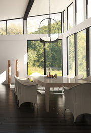 Devon 6 Light 24" Pendant in Matte Black in a room setting
