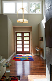 Devon 6 Light 24" Pendant in Modern Gold in a room setting