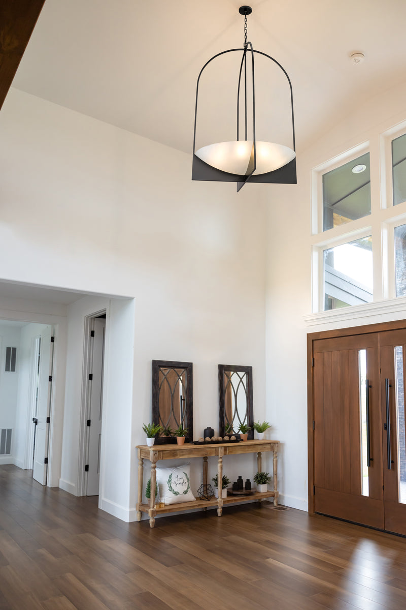 Devon 8 Light 32" Pendant in Matte Black in a room setting