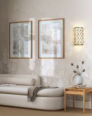 Harden 2 Light 8" Wall Sconce in Modern Gold in a room setting