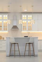 Harden 3 Light 12" Pendant in Modern Gold in a room setting