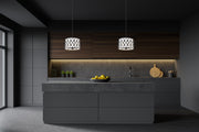 Harden 5 Light 18.25" Pendant in Matte Black in a room setting