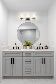Grayson 3 Light 23" Vanity in Brushed Nickel in a room setting
