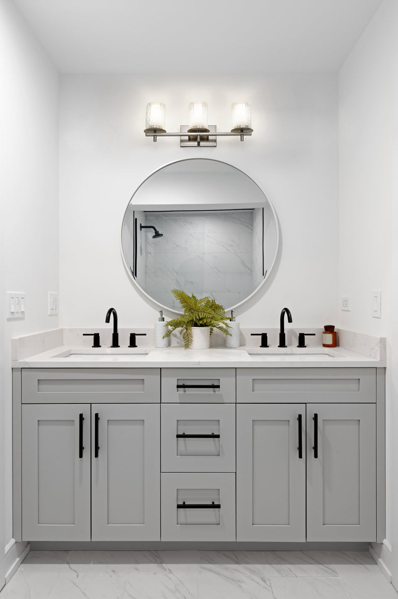 Grayson 3 Light 23" Vanity in Brushed Nickel in a room setting